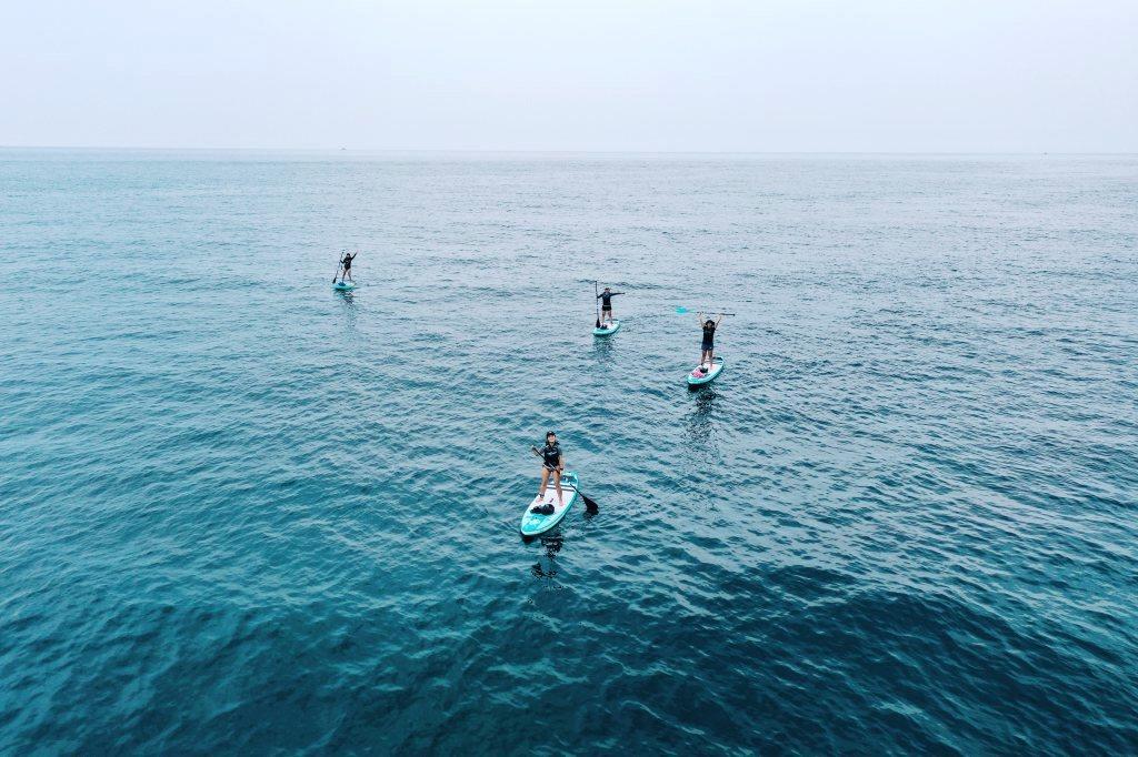 SUP, short for Stand-Up Paddle, is a watersport where you stand on a large surfb