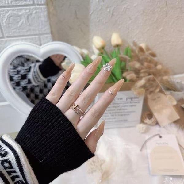 Sheer nail colors are softer, with less intense hues, making hands look gentler