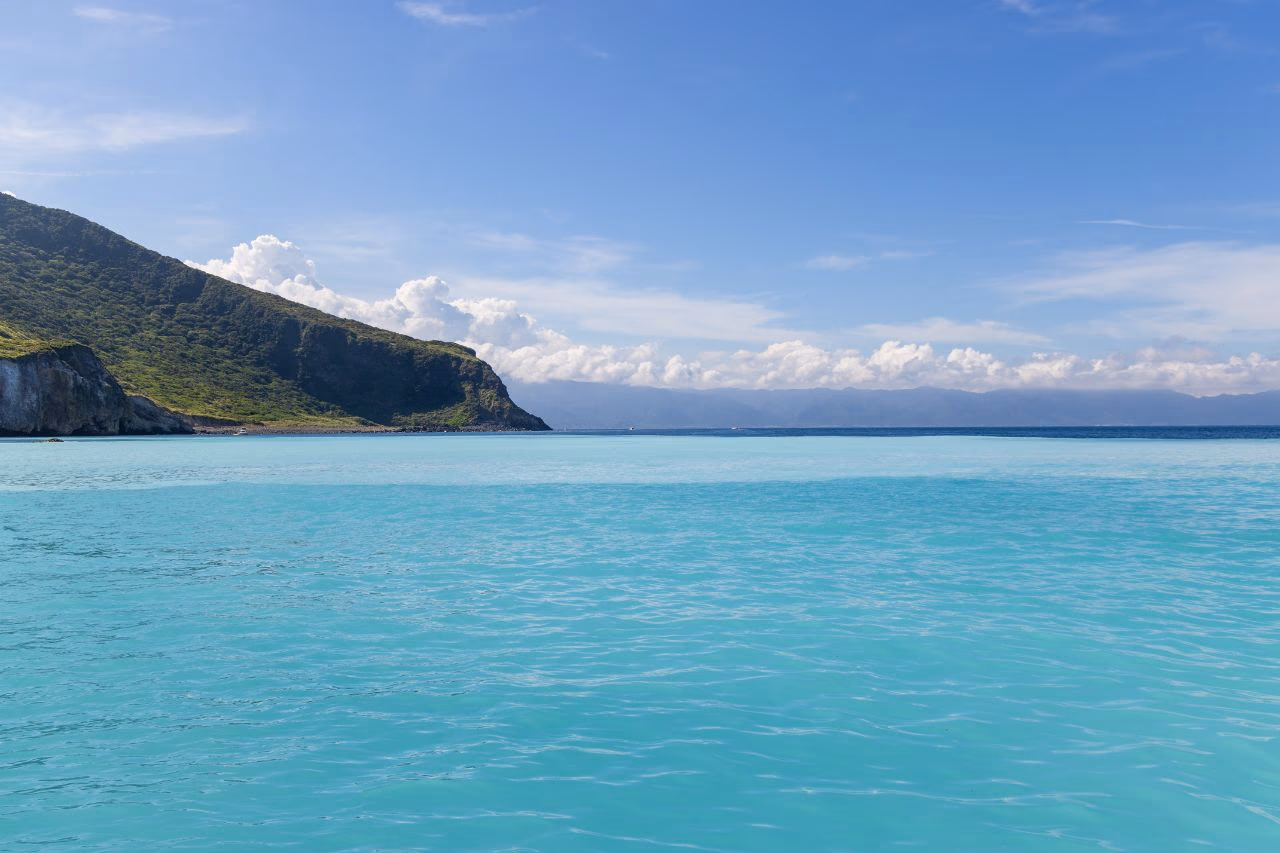 The best time to visit Guishan Island's Milk Sea is during the summer.