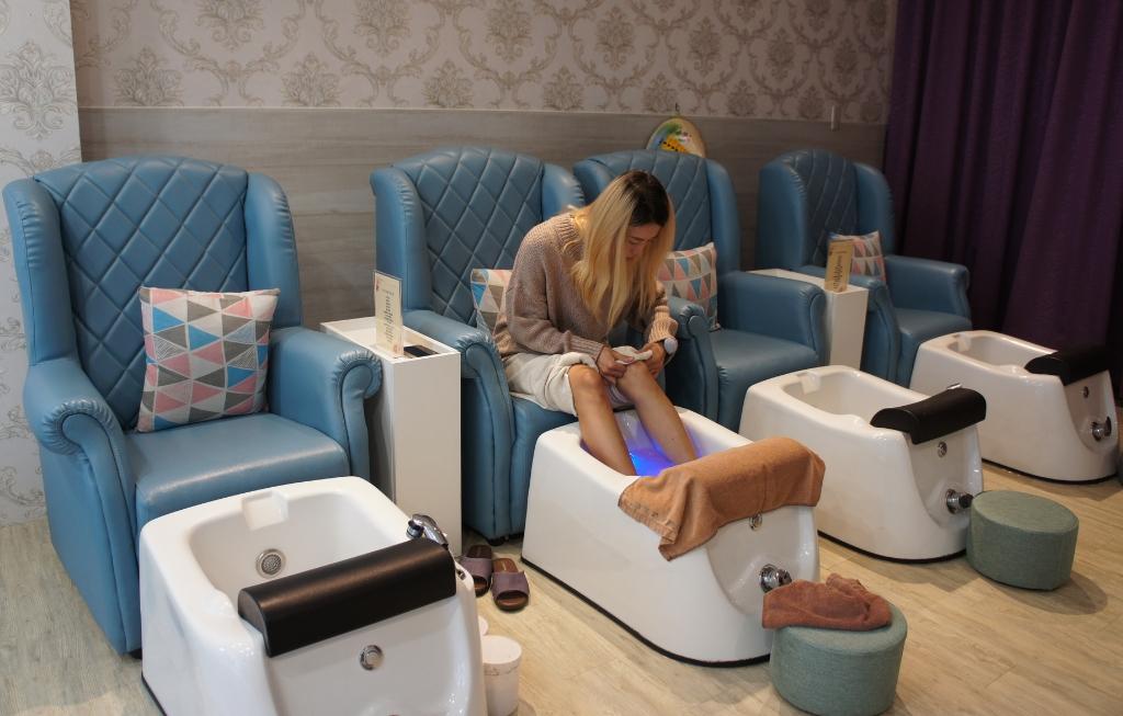 Indulge in a luxurious foot bath and expert care for ultimate relaxation.