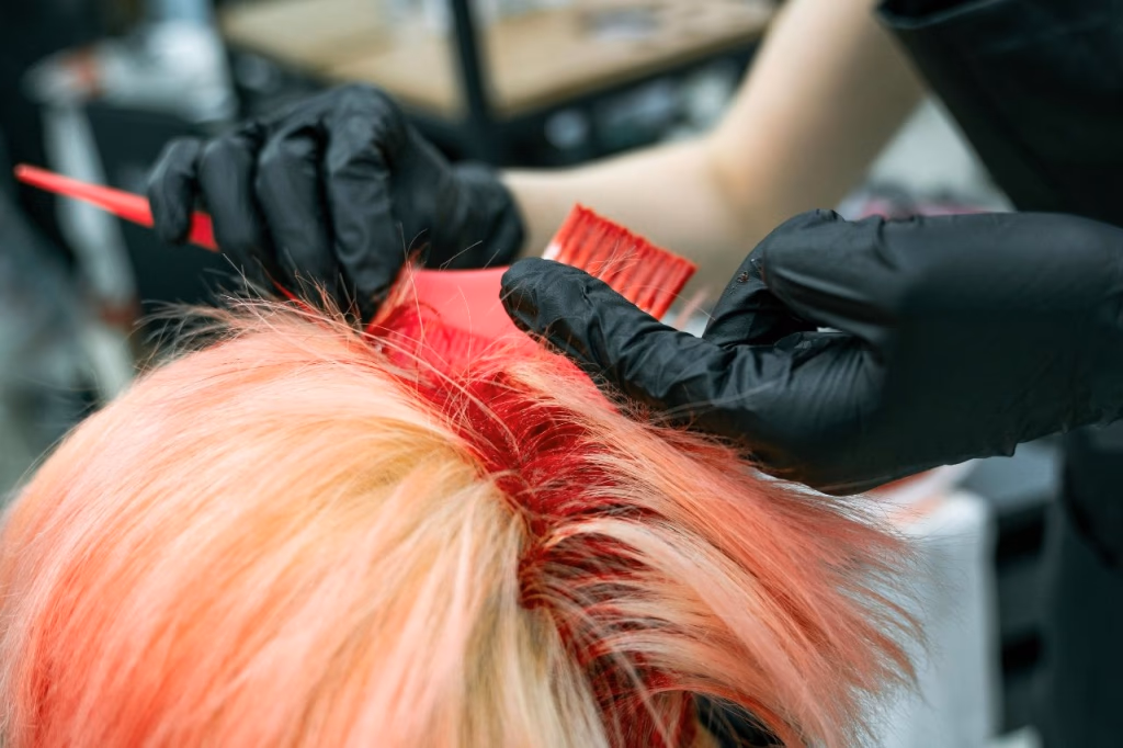 To prevent hair color from fading, avoid washing your hair immediately after coloring, use color-safe shampoos and conditioners, and limit exposure to heat and direct sunlight.