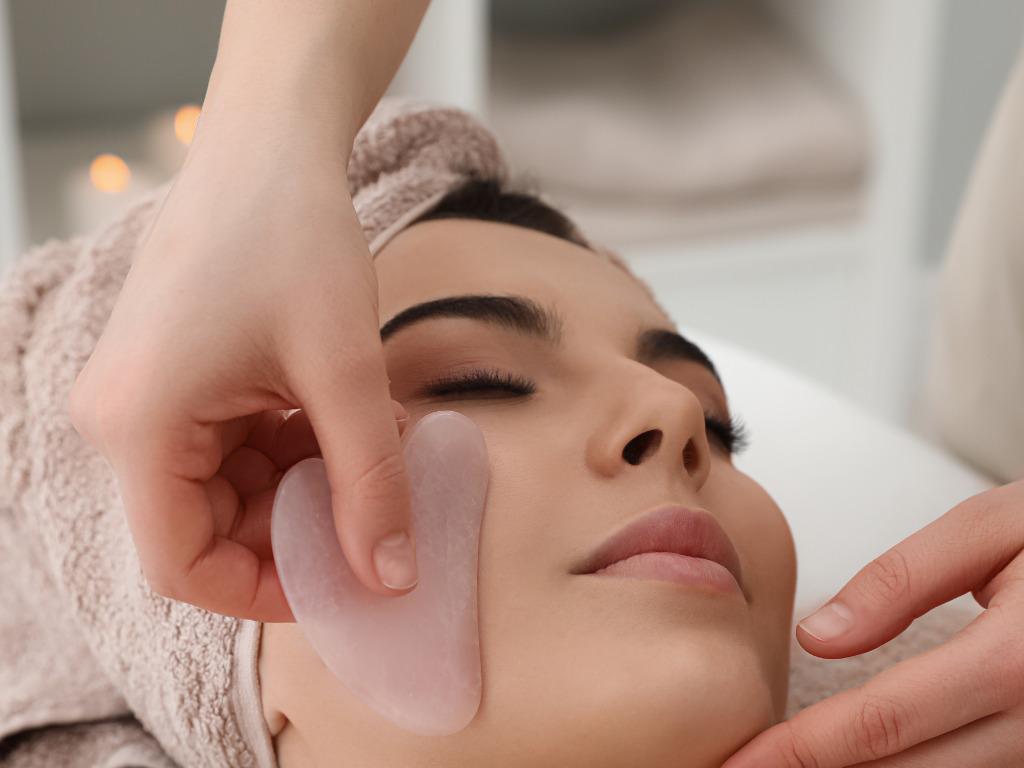 Facial rollers and gua sha tools are classic choices for a slimmer-looking face,