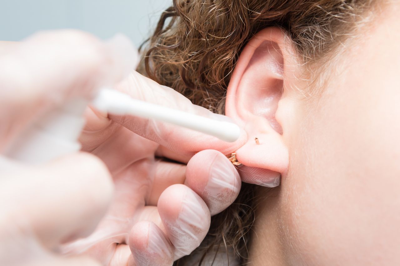 How To Treat An Infected Ear Piercing? Symptoms And Prevention