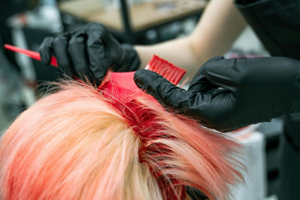 To prevent hair color from fading, avoid washing your hair immediately after coloring, use color-safe shampoos and conditioners, and limit exposure to heat and direct sunlight.